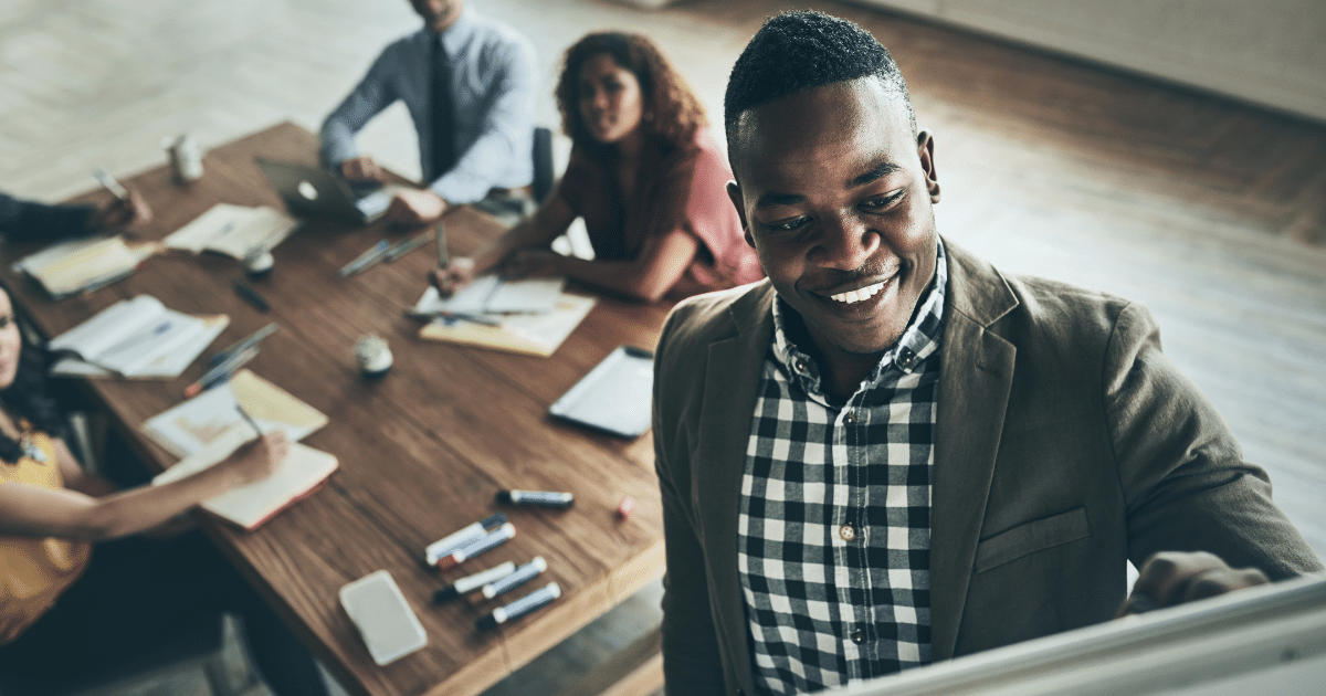 image-of-business-man-with-confidence-presenting-to-a-team