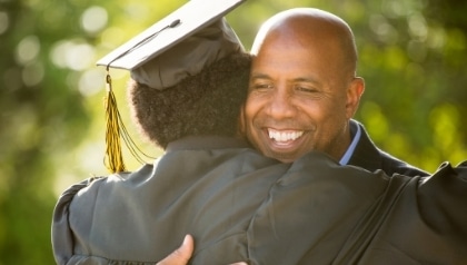 Graduate success - celebrating her father - iQ Academy